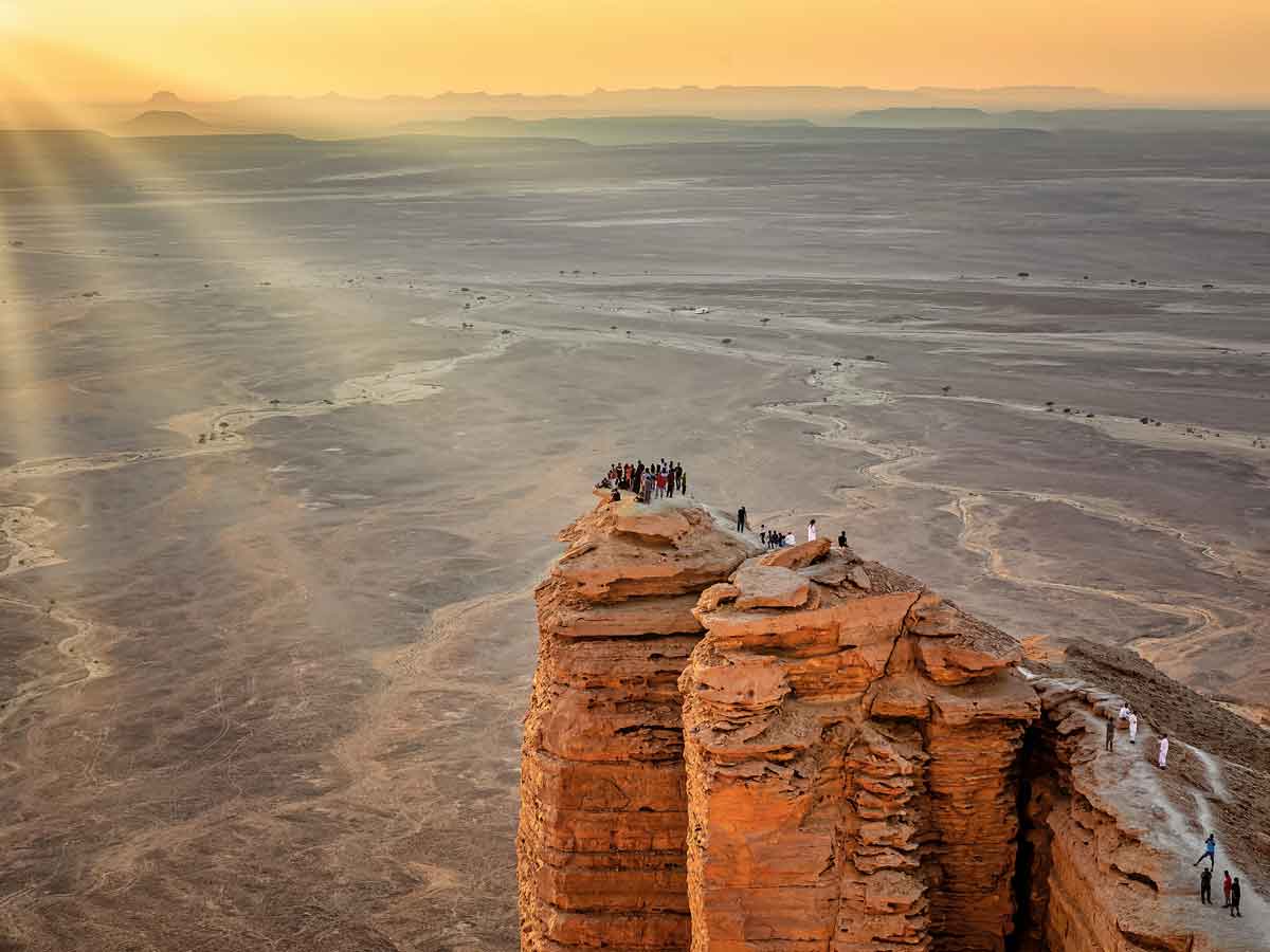 The Edge of the World (Jebel Fihrayn) — a sheer 300-metre cliff on the Tuwaiq escarpment, roughly 90 minutes drive west of Riyadh.